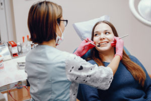 girl sitting dentists office